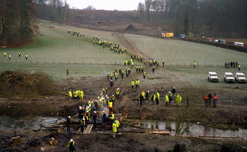 dawn invasion approaching rickety bridge on eviction day 2