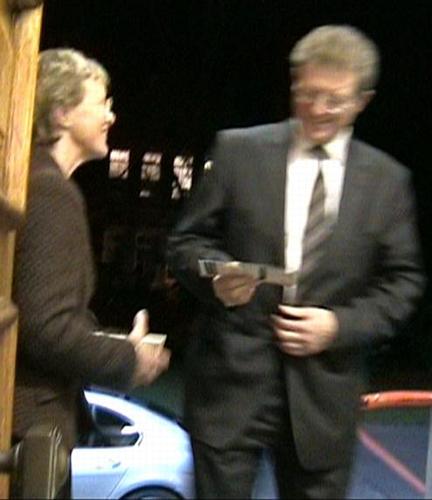 The mayor accepts a leaflet