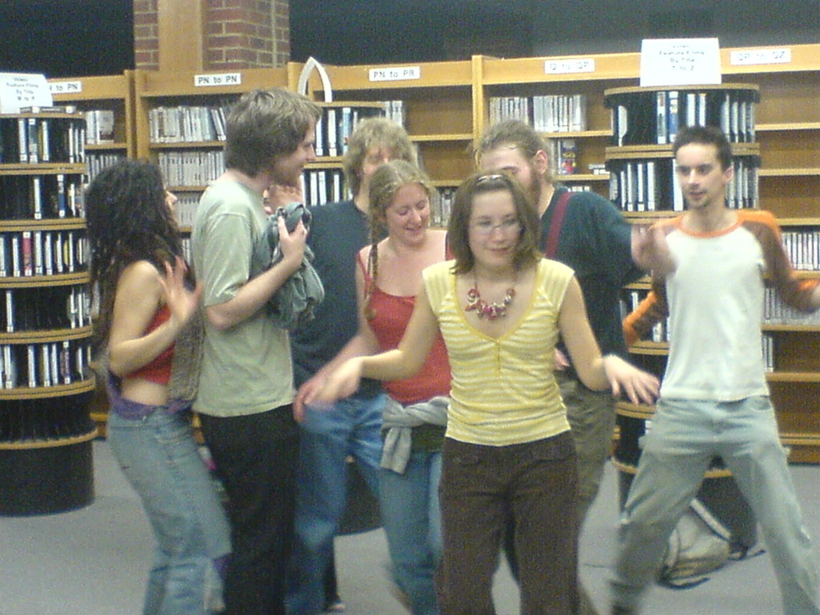 Rebel Clown Army Training amongst the books and videos