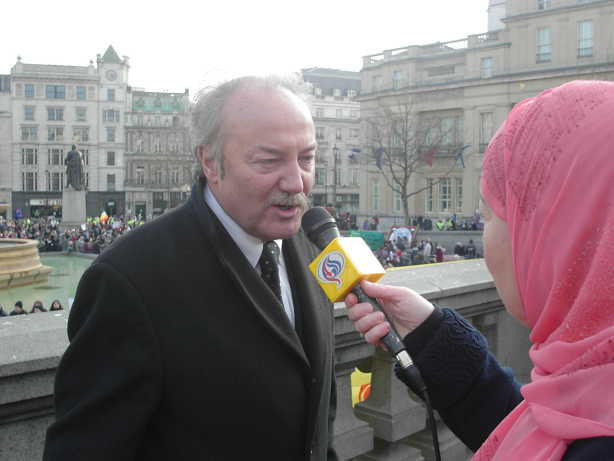 George Galloway being imnterviewed by Muslim woman
