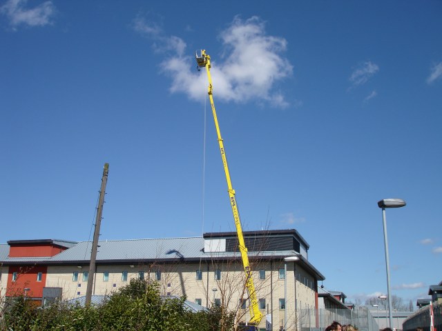 CCTV hanging from a crane to watch the demo