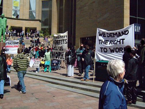 Protesters demand the right to work and an end to dawn raids
