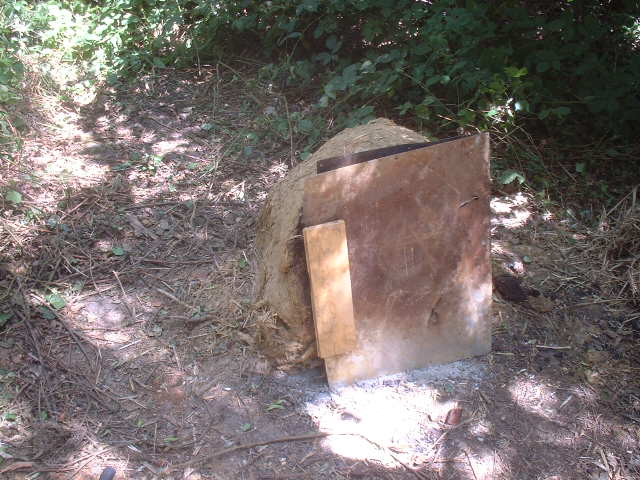 bread cooking in the clay oven