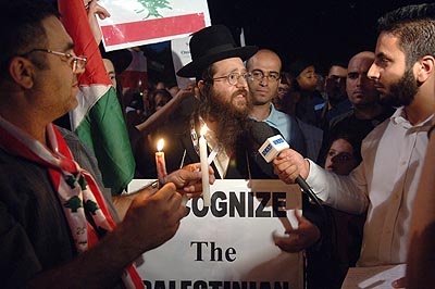 An anti-zionist jew is applauded as he is interviewed by the Islam Channel.