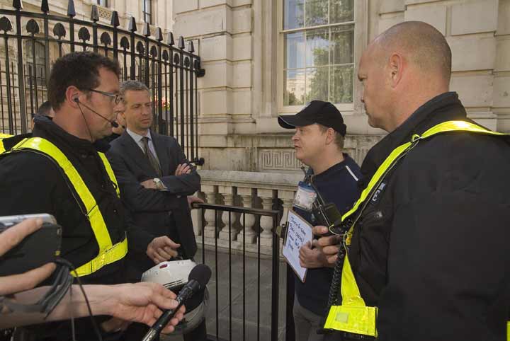 Mark Kemp being questioned by the coppers after handcuffing