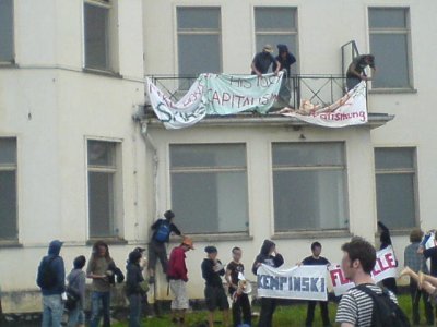 a nearby building is occupied and defended