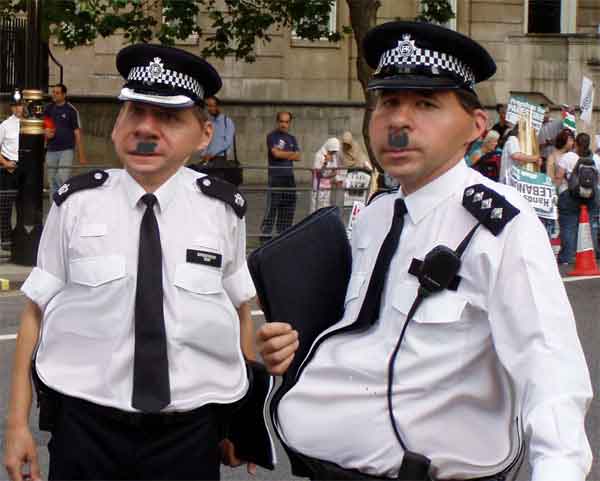Two policemen sans airbrush
