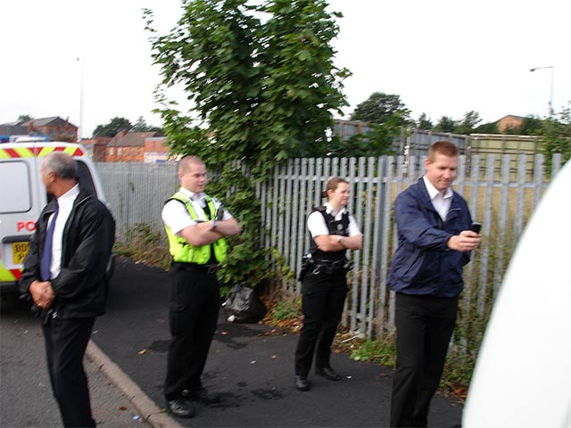police and bailiffs in the ghetto