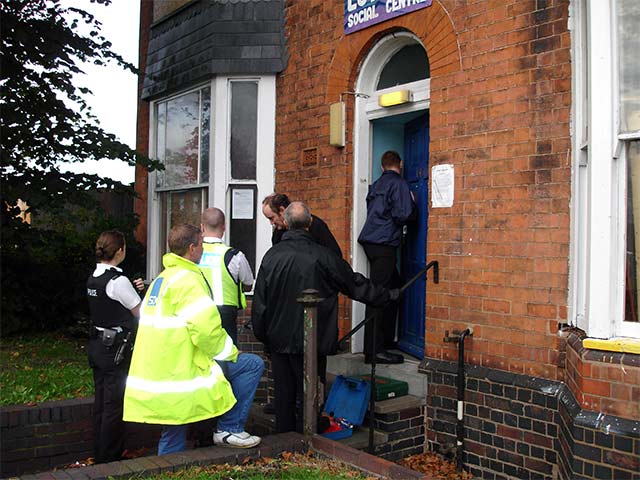 bailiffs attempt to get past barricaded front door