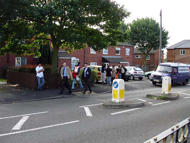 locals look on in disbelief as their council carries out a violent eviction