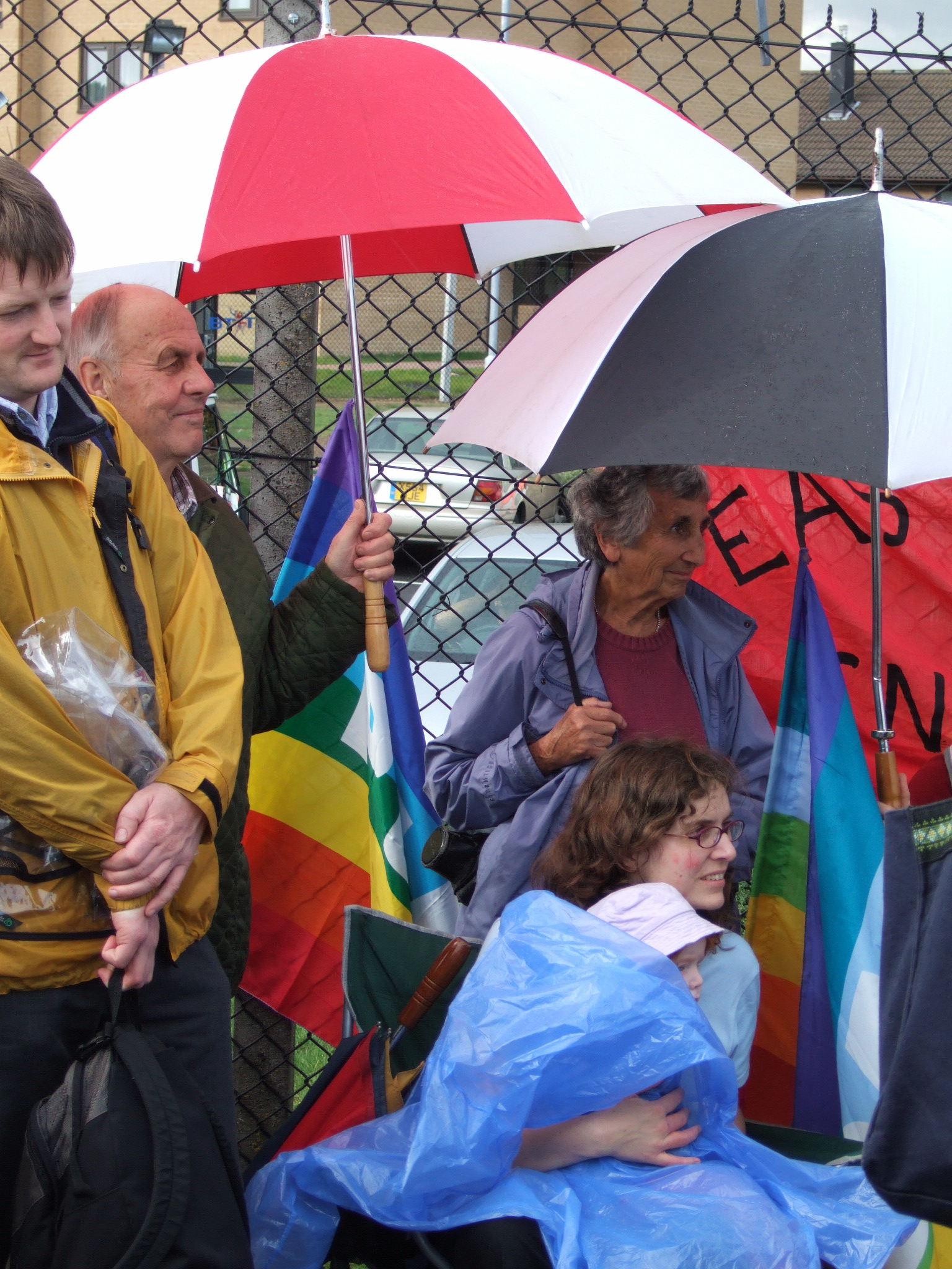 Young and Old Sheltering from the Rain