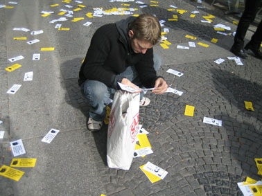 Passers-by picked up the leaflets of the exploded foreigners law