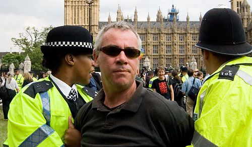 The mystery man remains a mystery.