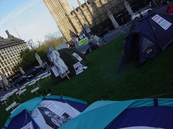 an Iraqi man in front of tent