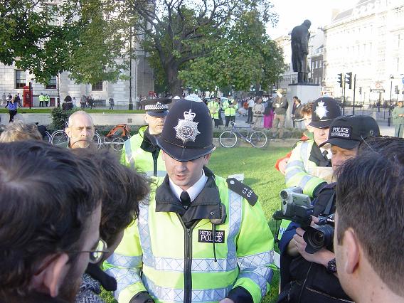 Police tells protestor he is being arrested
