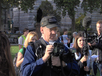 They photograph us like criminals