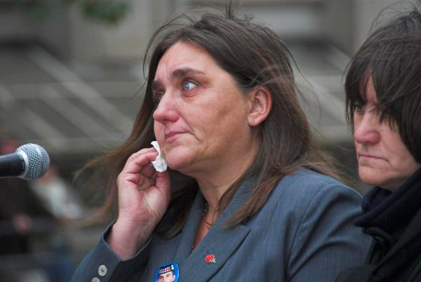 Rose Gentile fights back tears as she speaks