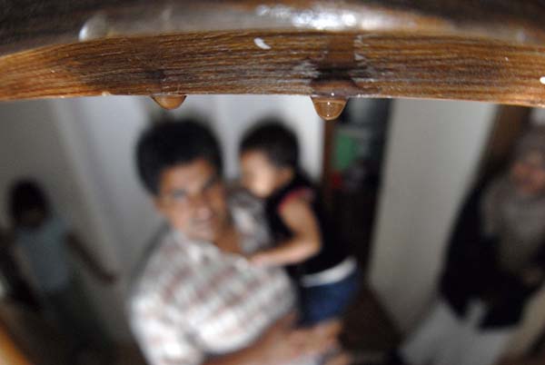 liquid drips through ceiling