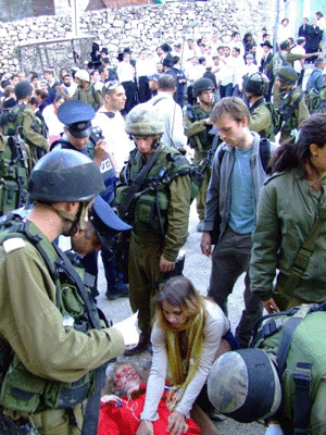 perhaps if we tried putting flowers down the barrels of their guns