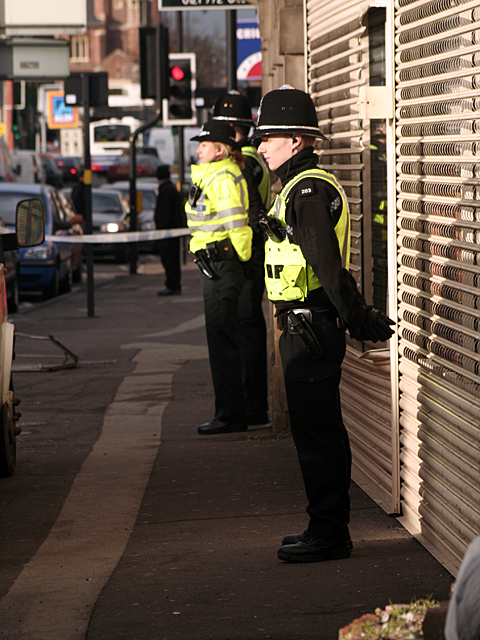 Police Guard the Maktabah book store in Stratford Road, Sparkhill.