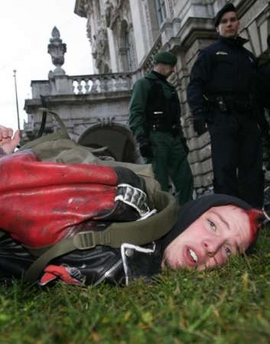 German riot police arrest demonstrators after a rally against the 43rd Conferenc