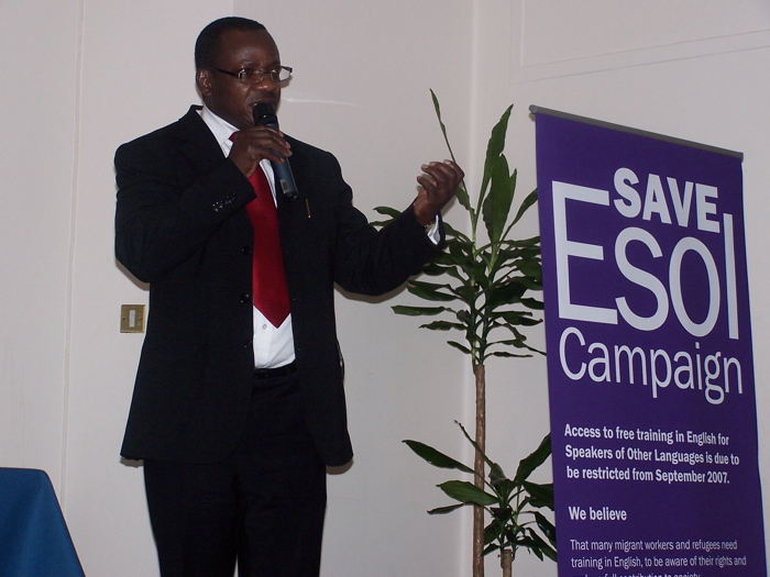 A Huddersfield Tech ESOL student speaks at the rally