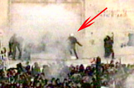 cop is throwing fire bomb