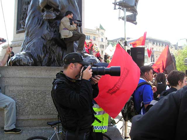 One of the many police intimigraphers.