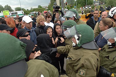 Cops attempt to kick things off...