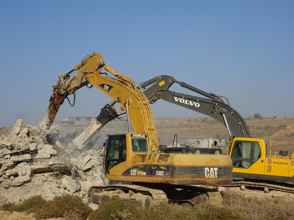 Volvo and Caterpillar equipment demolish Palestinian homes in the West Bank