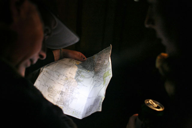 Activists finding their way in the night to the site of the Climate Camp