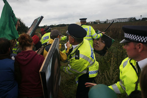 Breaking through police lines.