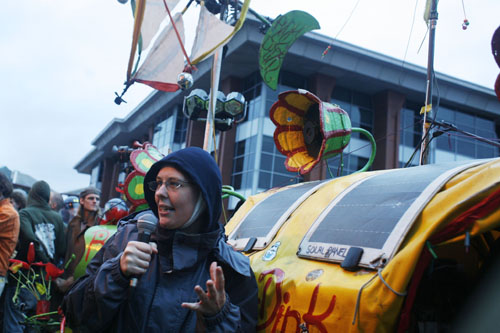 A woman is reading out beautiful poetry, inspite of head injury.