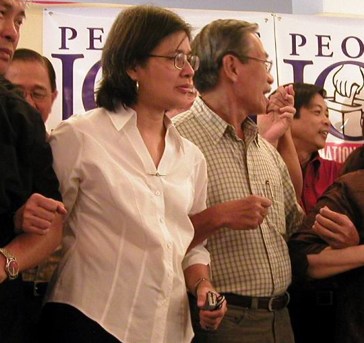 Dr. Carol P. Araullo, with Rep. Satur Ocampo, in a people's rally in Manila