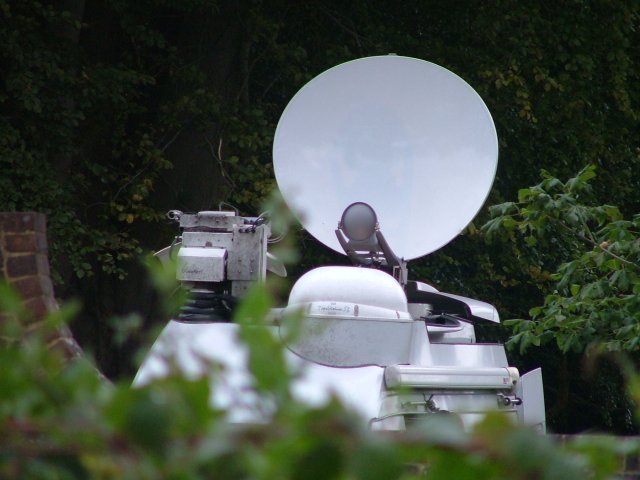 BBC satellite truck outside the camp