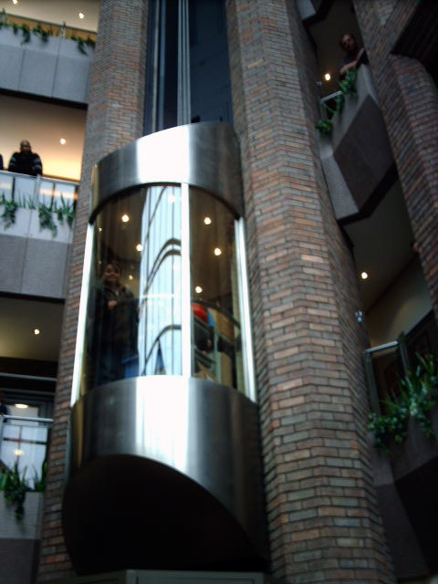 talking to the cleaning staff in the lift