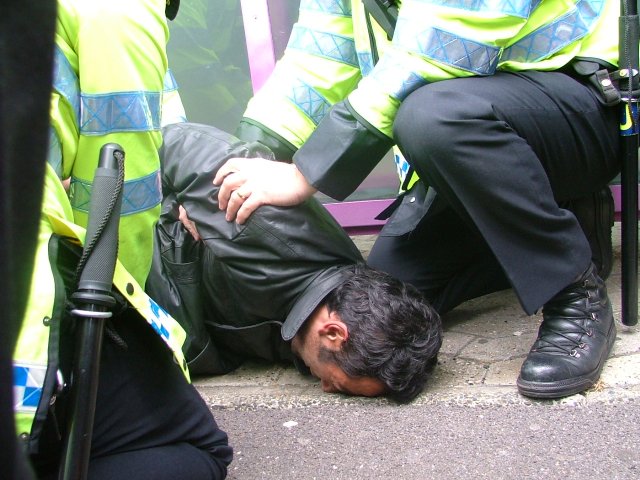 an asylum seeker being violently arrested in Croydon