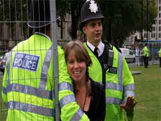 Police Adminsiter Hugs To Onlookers