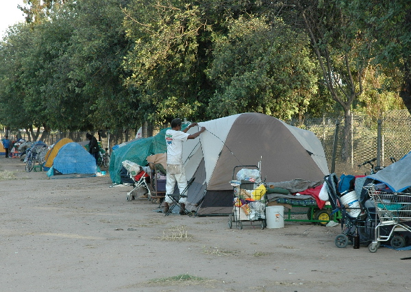 happy, free and wealthy people wawing tents in the USA