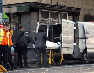 Body of dead antifascist activist being carried away