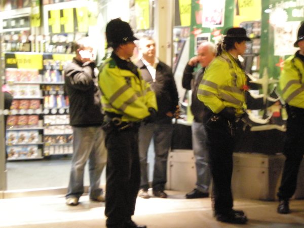 Who are these three men the cops are protecting?