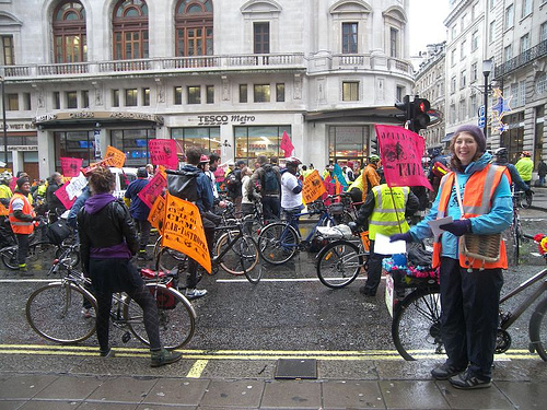Photo by Mike Greenville: Cyclists listen to speech on Tesco's and biofuels