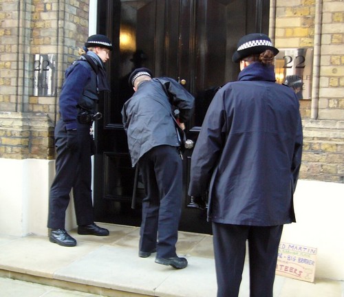 cops assist nuclear profiteers