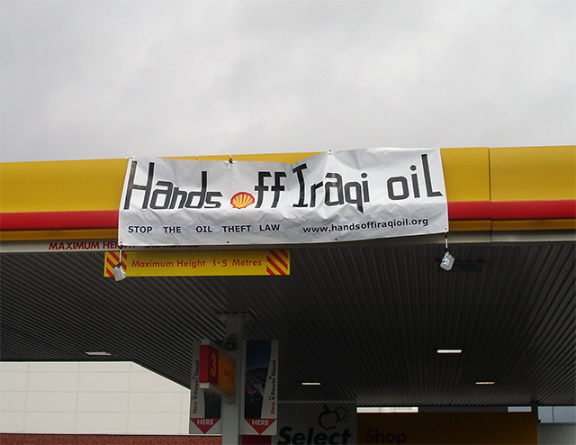 Banner drop from Shell forecourt roof