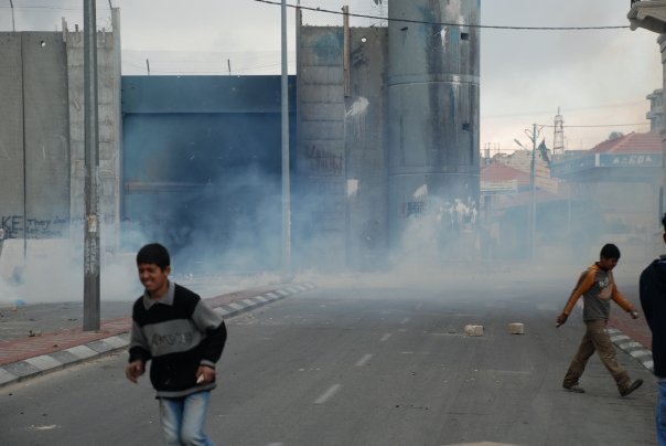 Boys retreat from tear gas