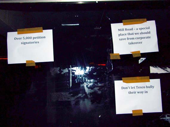 Signs on the front of the old Wilco store front.