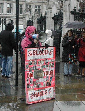 Barbara Tucker does her stuff outside Parliament