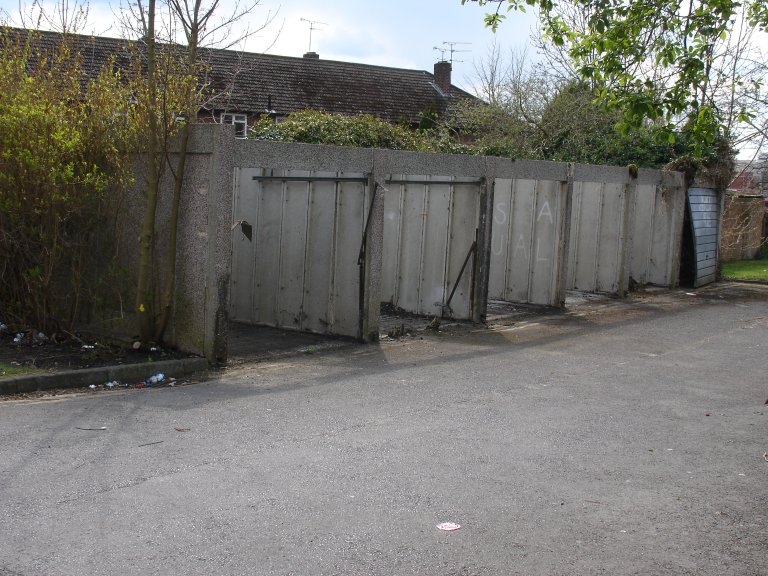derelict semi-demolished garages