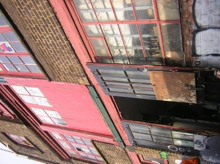 ... the façade of the reclaimed building ...