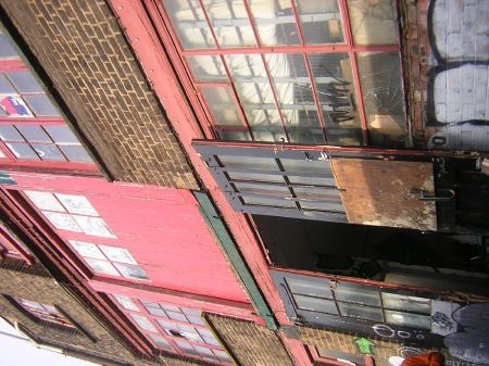 ... the façade of the reclaimed building ...